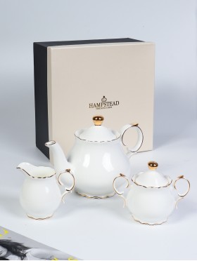 White with gold plated tea pot, creamer & sugar pot set